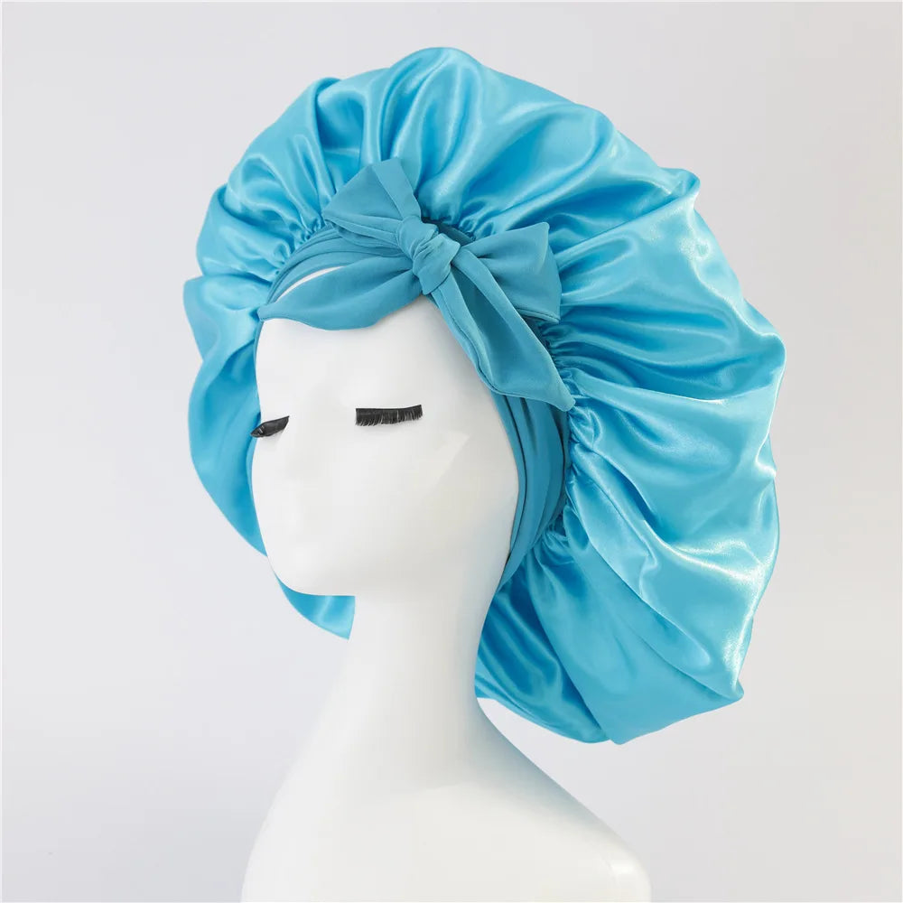 Bonnet de sommeil pour femmes en satin uni, bande élastique extensible avec lien, bonnet de douche de nuit ajustable pour protéger les cheveux.