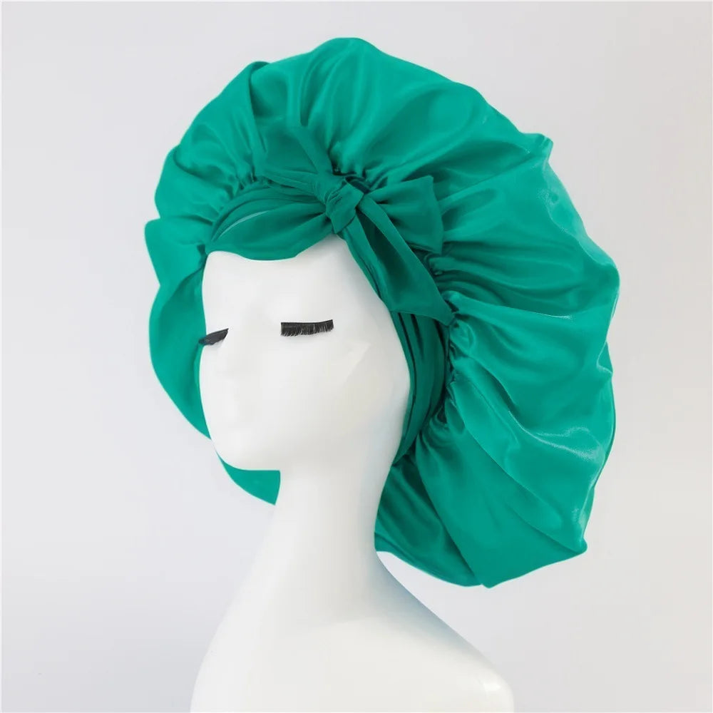 Bonnet de sommeil pour femmes en satin uni, bande élastique extensible avec lien, bonnet de douche de nuit ajustable pour protéger les cheveux.